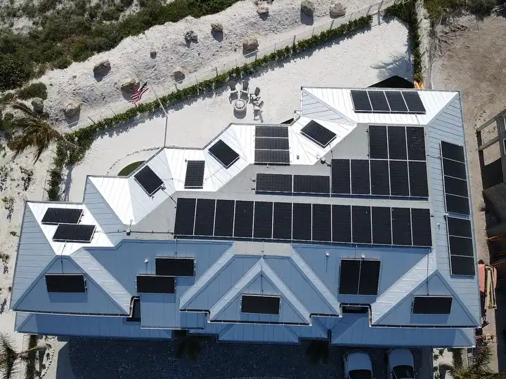 https://bluevisionroofing.com/wp-content/uploads/2025/07/Blue-Vision_Our-Work_Residential_Metal-Roof_Aerial-View_compressed.webp