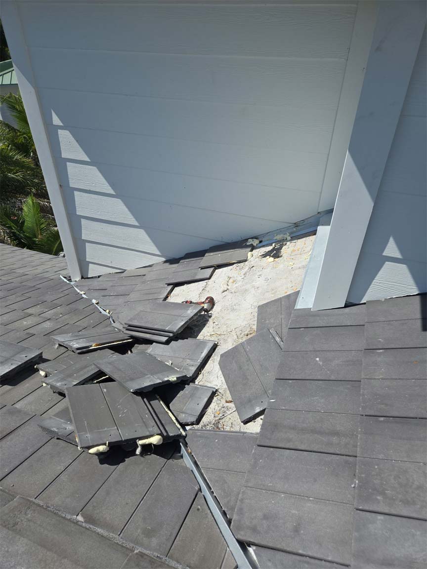 https://bluevisionroofing.com/wp-content/uploads/2025/09/Tiles-Gone.jpg